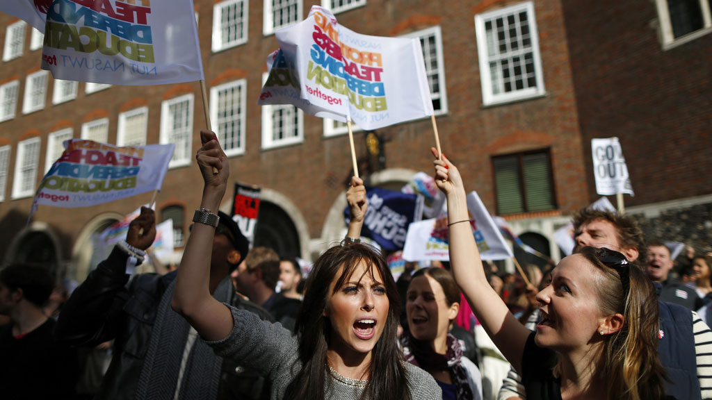 A teacher shouts slogans outside the Department of Education during a protest by striking education workers in central London in October (G/R)