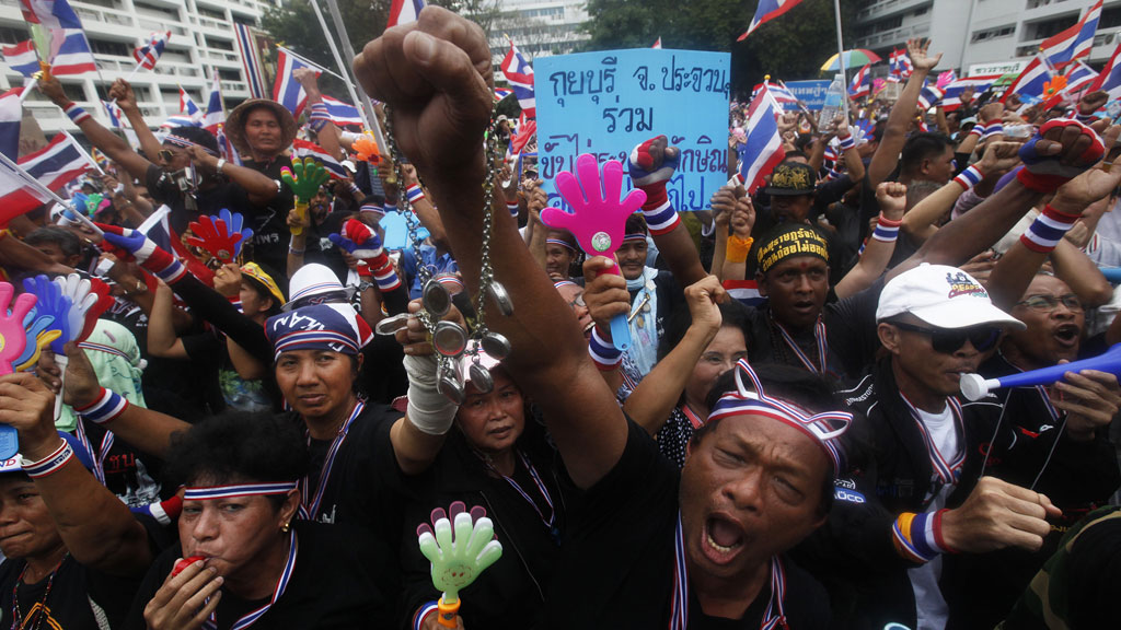 Protesters in Thailand occupy the grounds of the national army headquarters, asking the military to support their increasingly tense campaign to topple Prime Minister Yingluck (G/R)