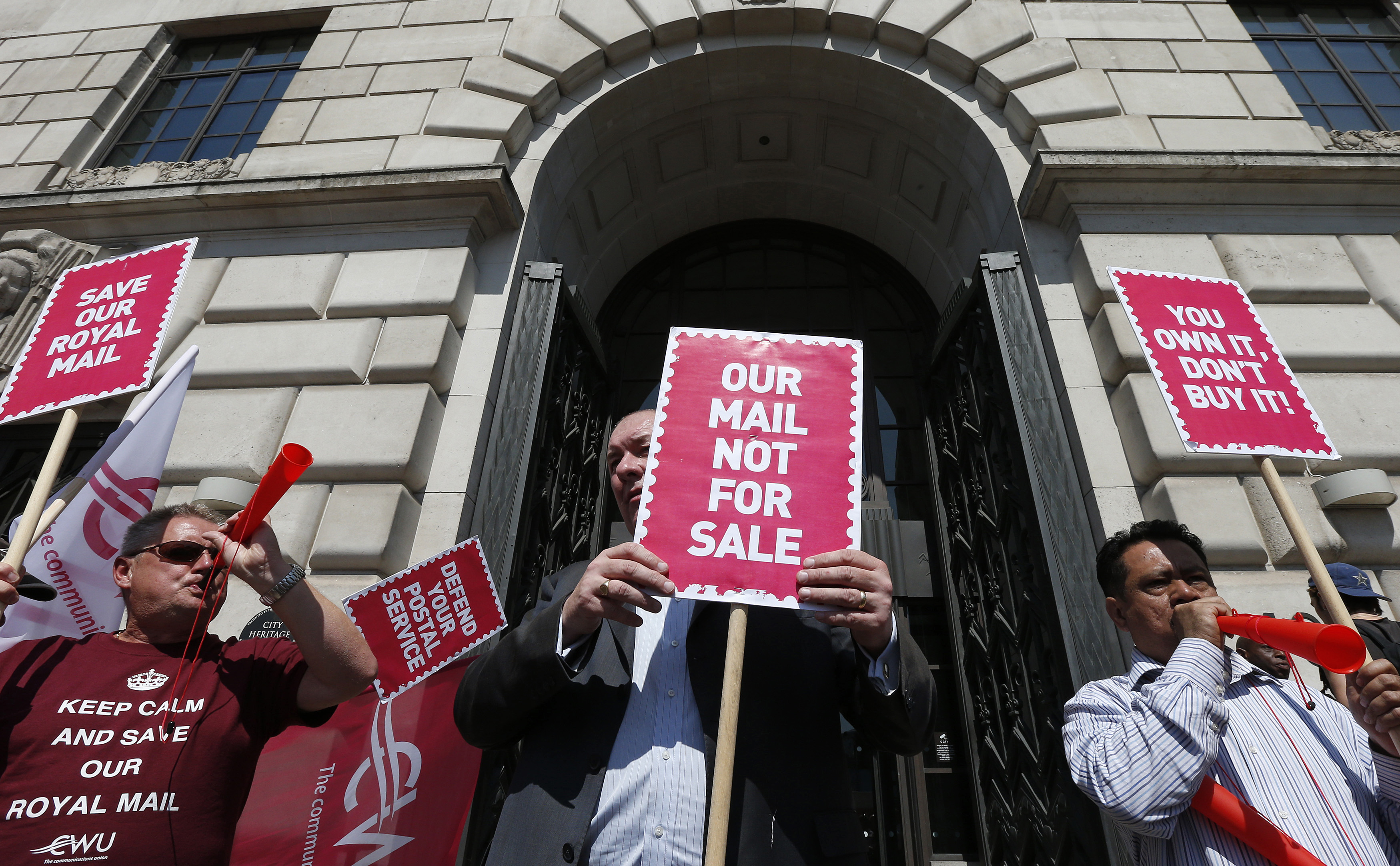 Trade unionists protest at the privatisation of Royal Mail (Reuters)
