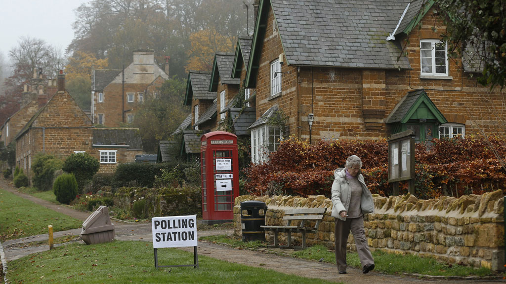 Electors should have to prove who they are before allowed to vote at a polling station, the UK elections watchdog says (Reuters)