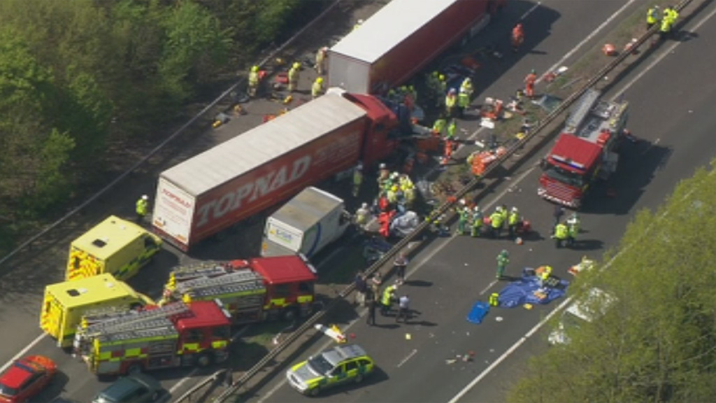 Emergency services attend a crash on the M26 motorway in Kent