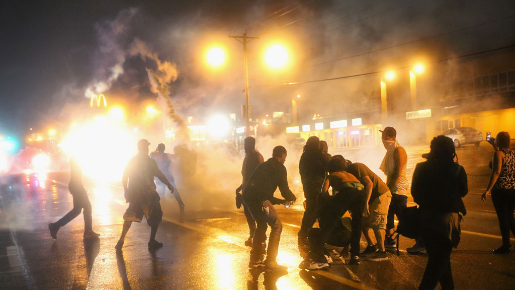 Protesters defy curfew in Ferguson after Mike Brown shooting