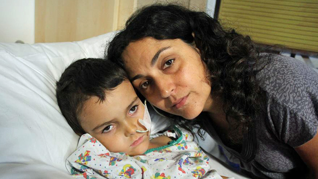 Ashya with his mother