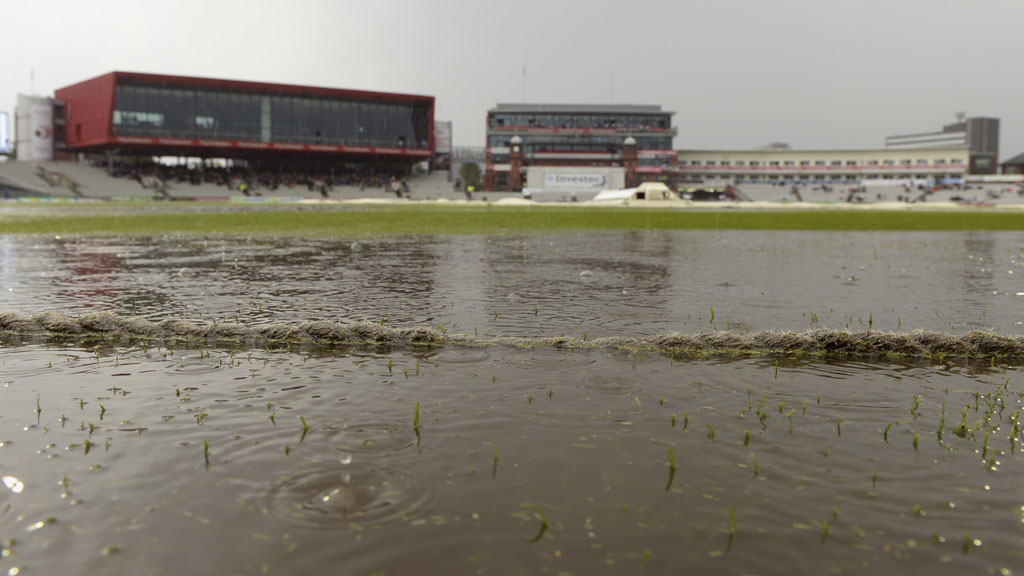 Rain stops play at the Old Trafford cricket ground (Reuters)