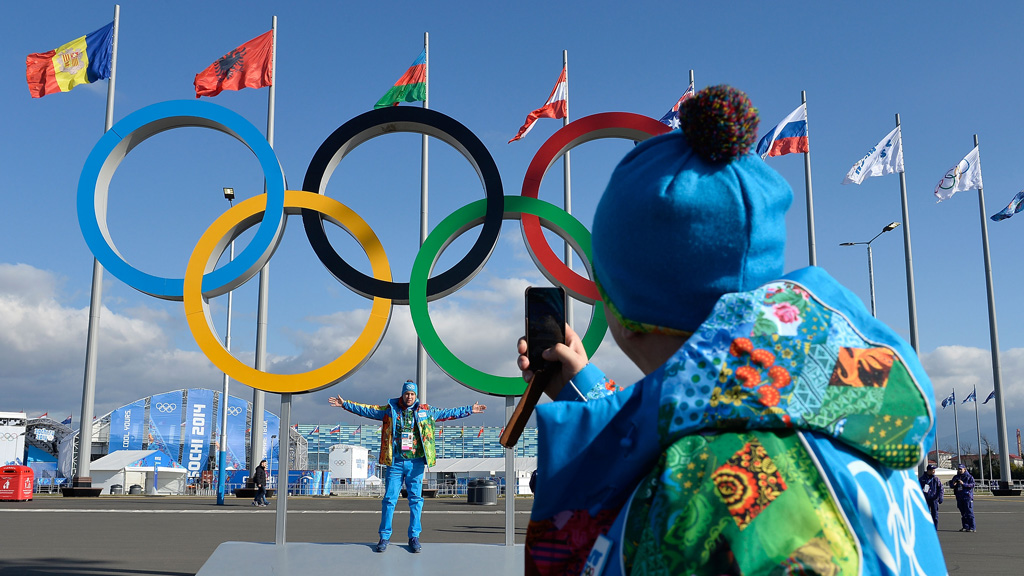 Sochi volunteers in rainbow-coloured uniforms. (Reuters)