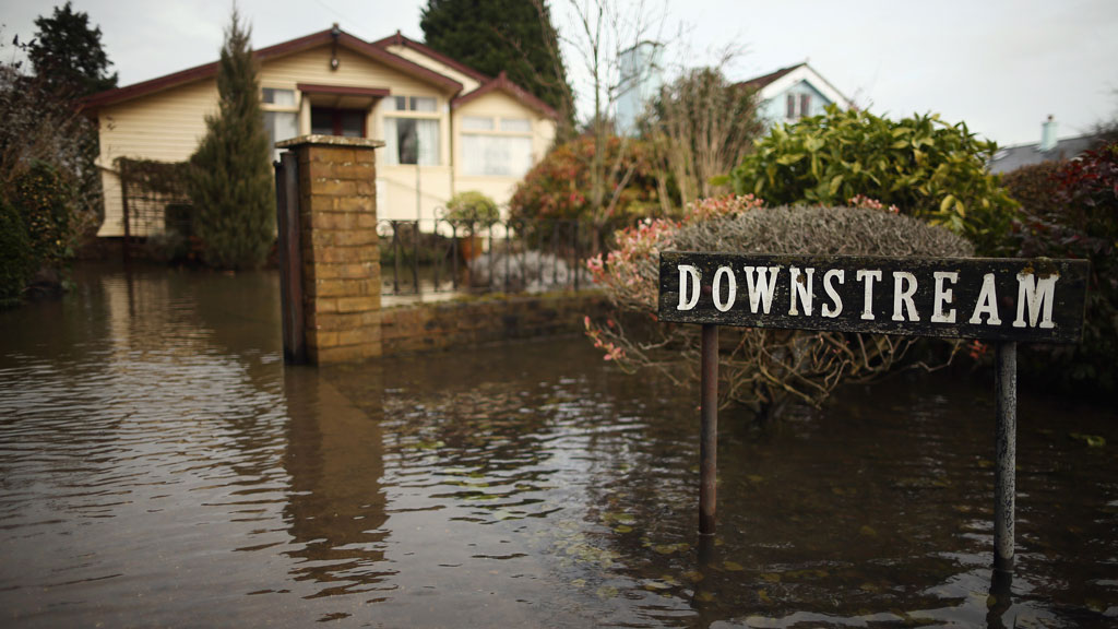 A view of a flooded driveway to a house in Chertsey (Getty)