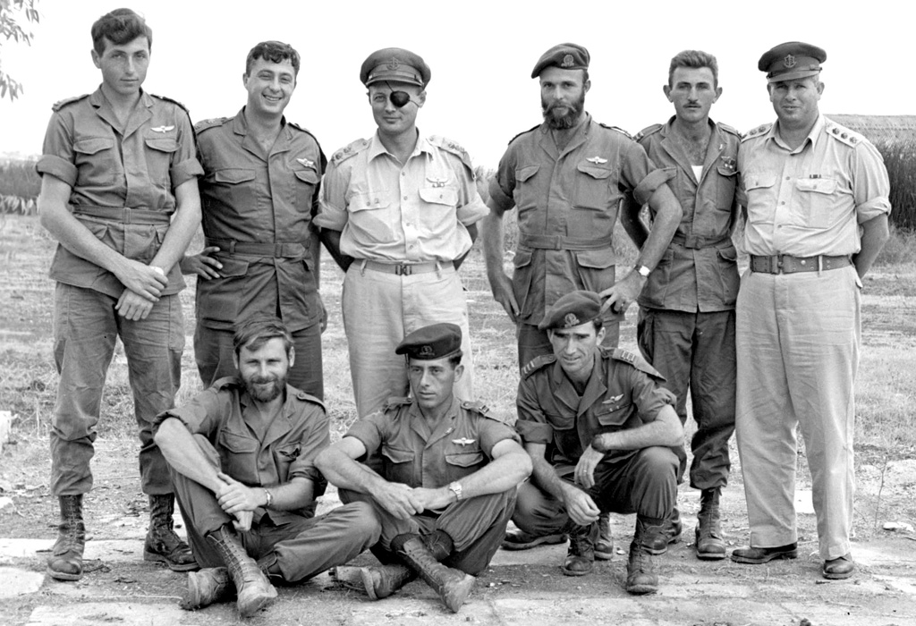 Sharon with Moshe Dayan and other Israeli military leaders in 1955
