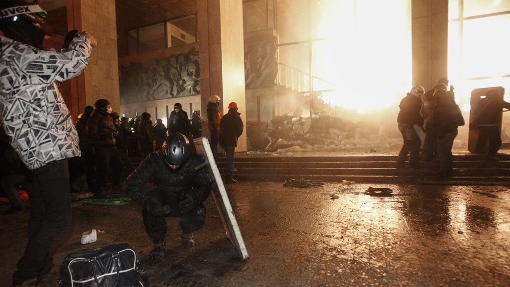 Ukraine protests: demonstrators attack Ukrainian House (picture: Reuters)