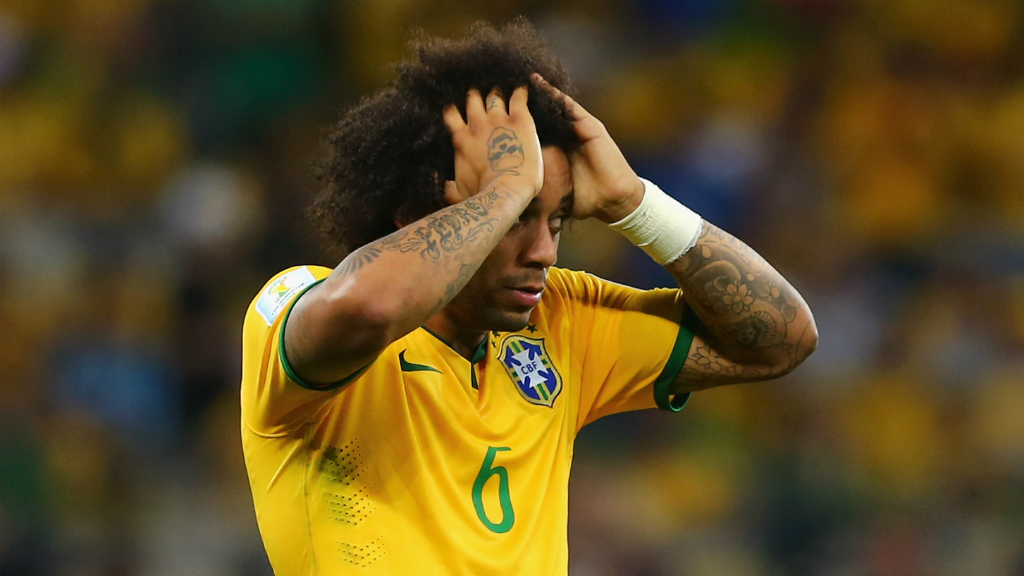 Brazil's Marcelo fights back the tears as the German's smash home their sixth goal. (Getty)