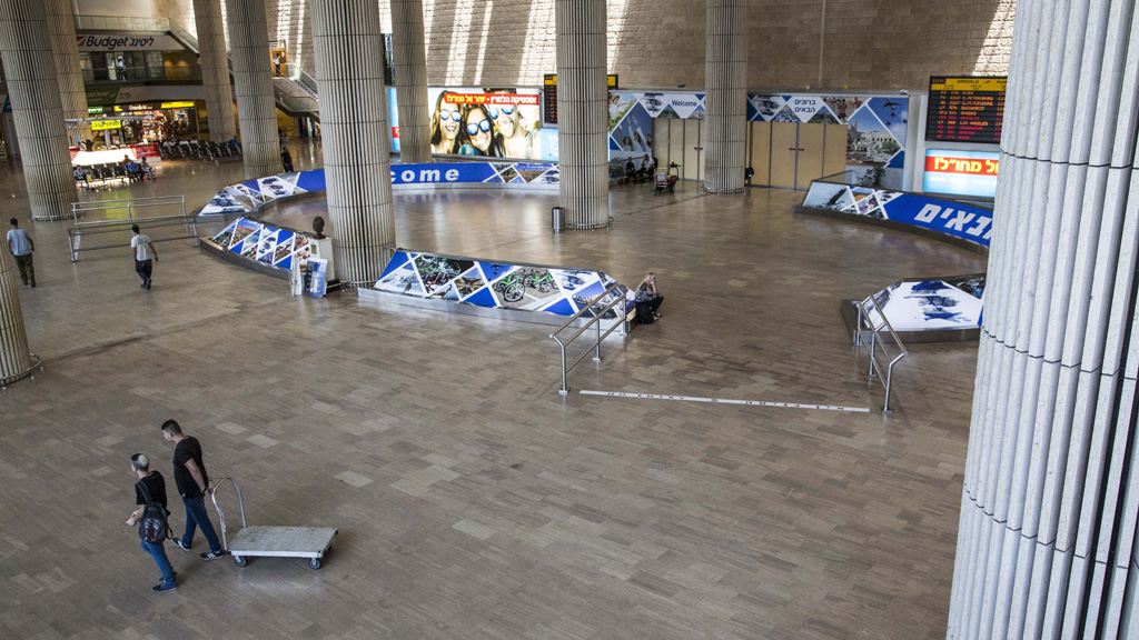 A nearly empty arrival lounge of Ben Gurion International airport, near Tel Aviv (Getty)