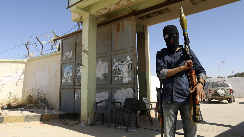 Militaman outside base in Libya (picture: Reuters)