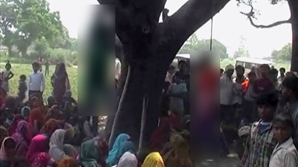 The two girls raped and hanged from a tree in India