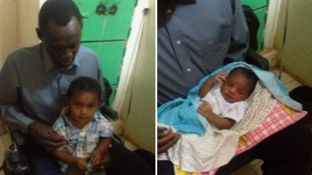 Meriam Ibrahim's husband Daniel Wani with the couple's young son and baby daughter 