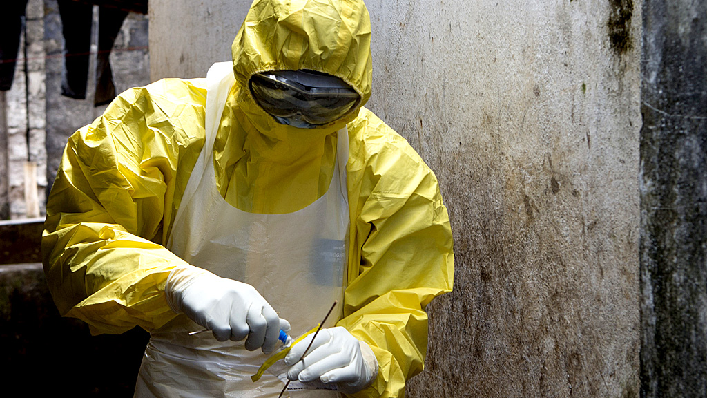 Anti-Ebola worker in Sierra Leone (Reuters)