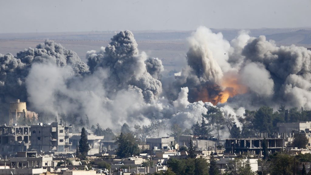 Coalition air strikes rock Kobani (Reuters)