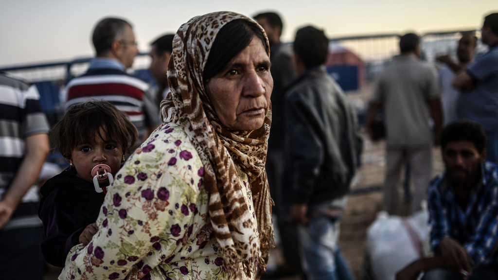 Kurdish Syrian refugee at Turkey border