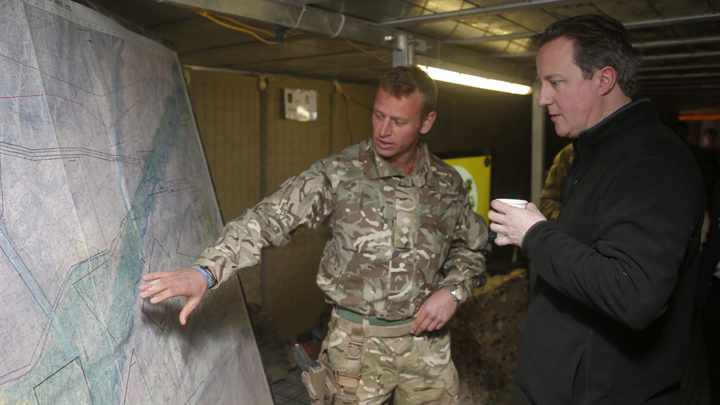 David Cameron at military briefing (Reuters)