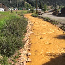Yellow polluted river water (Courtesy Russell Begaye)