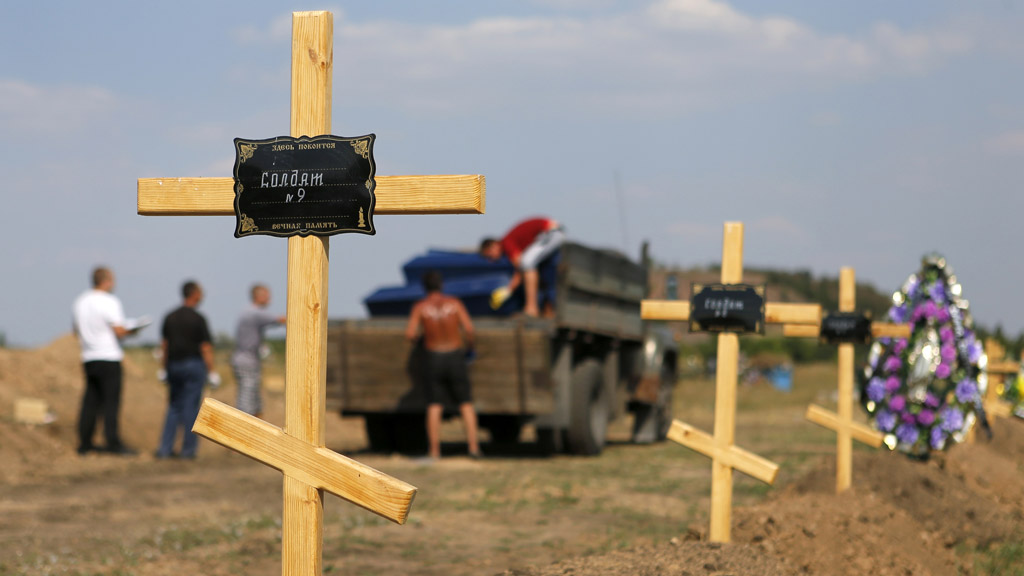 Graves of anonymous pro-Russian fighters in eastern Ukraine (Reuters)