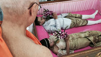  Couples climb in the coffin (Picture: Raul Gallego Abellan)