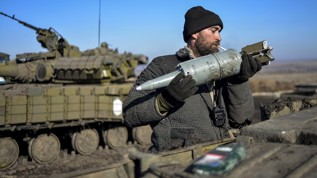A Ukrainian soldier prepares for fighting (Reuters)