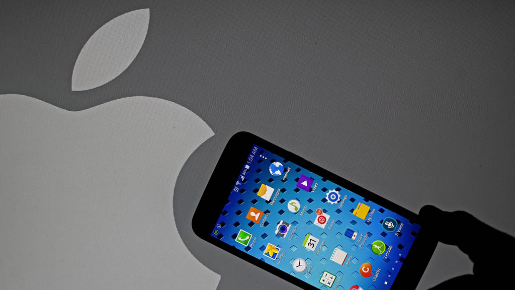 Apple logo and an iPhone (Reuters)