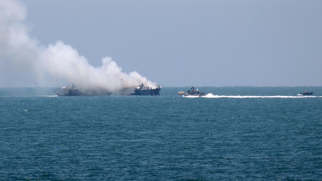 Smoke rising from an Egyptian naval vessel