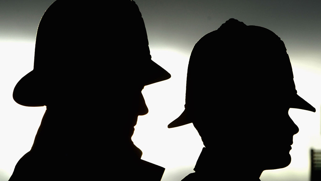 Silhouette of police officers (Getty)