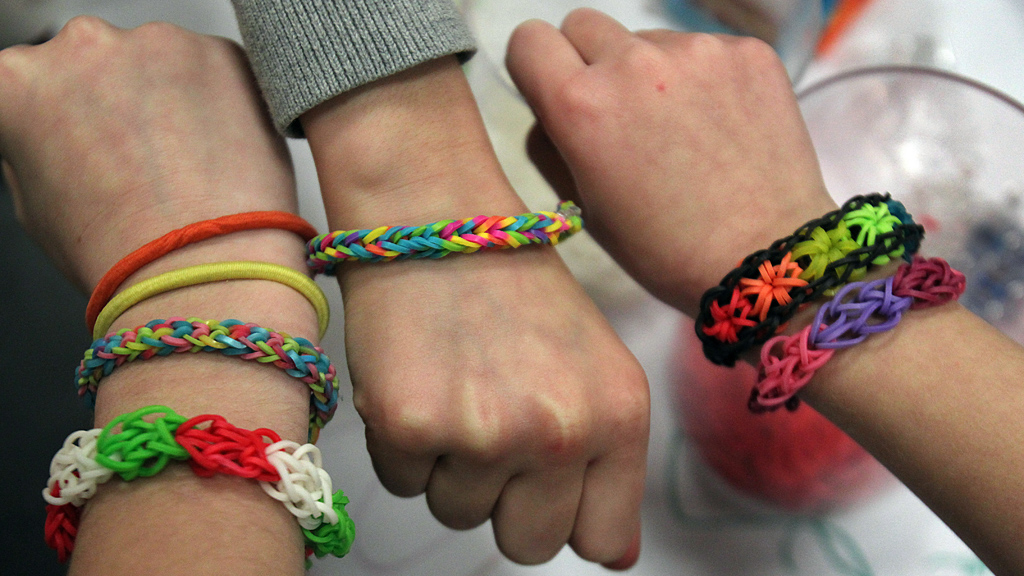 Loom Band bracelets on wrists (Getty)