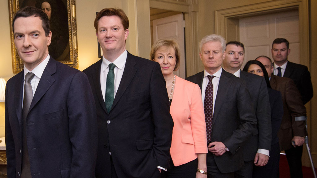 George Osborne poses with his Treasury team (Reuters)