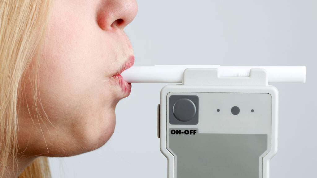 Woman takes breathalyser test (Getty Images)