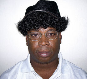 Christopher 'Dudus' Coke in Curly Wig disguise