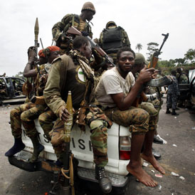 Forces loyal to Ouattara on the outskirts of Abidjan (reuters)