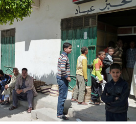 Libyans queue outside a bakery in Misrata, a rebel bastion
