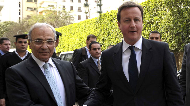 David Cameron shakes hands with Egyptian Prime Minister Ahmed Shafik (Reuters)