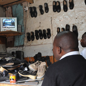 Kenyan cobbler watches the Royal Wedding (Getty)