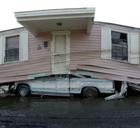 A house blown onto a car during Hurricane Katrina in 2005 (Reuters).