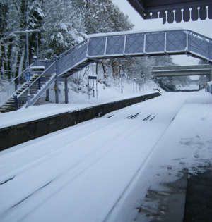 Railway station covered in snow