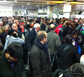 Passengers queuing at Heathrow's terminal 3 (picture by Paul Lomax)