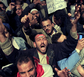 Tahrir Square is mobbed as protesters show their anger that Mubarak is staying in power (Reuters)