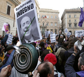Protesters in Rome call on Silvio Berlusconi to resign (Reuters)