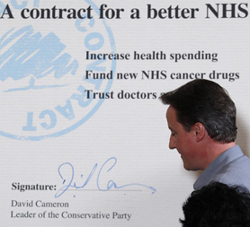  David Cameron signs 