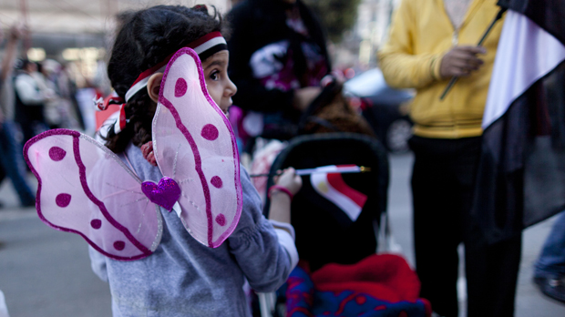 Egypt protests: girl at celebration in Tahrir Square. (Getty)
