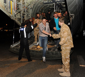 Libya crisis: Brits brought to safety in Malta. (MoD)