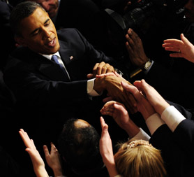 US President Barack Obama is greeted following his State of the Union address. (Getty)
