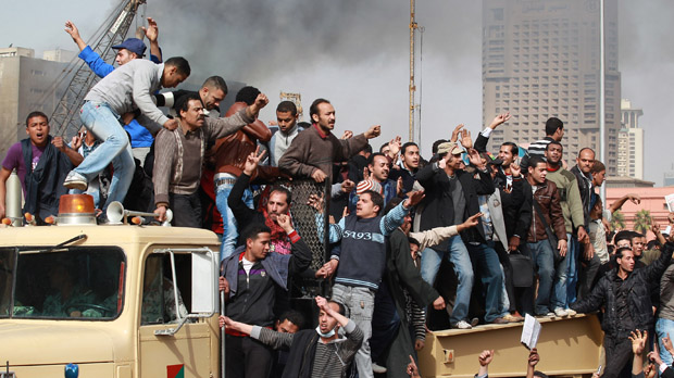 Egypt: crowds of protesters in Cairo ignore a 4pm curfew. (Getty)