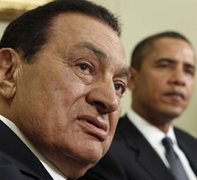 Looming large - Mubarak with Obama last summer (Reuters)
