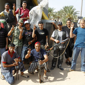 Libyan rebels celebrate victory on the Misrata frontline (Reuters)