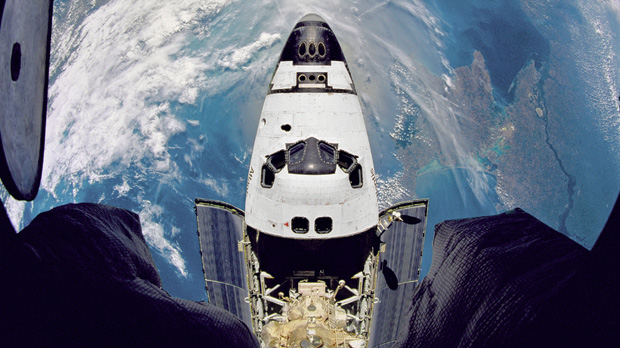 Shuttle over earth through a fisheye camera - Reuters