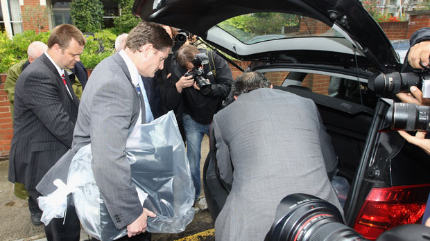 Police removing items from the house of Andy Coulson (Getty)